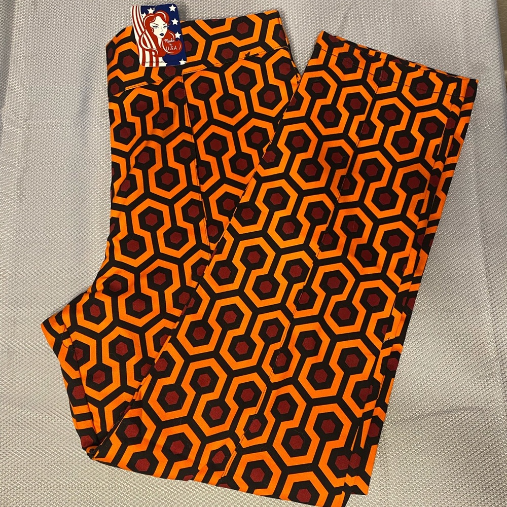 NWT Pinup girl clothing trousers in “red hexagon haunted hotel” print 2X
